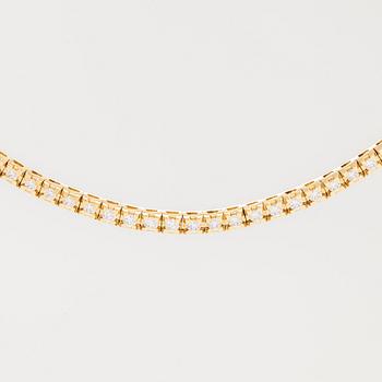 Collier, rivieré, 18K guld med briljantslipade diamanter. Corvino, Italien.