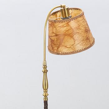 A floor lamp by Einar Bäckström, mid 20th century.