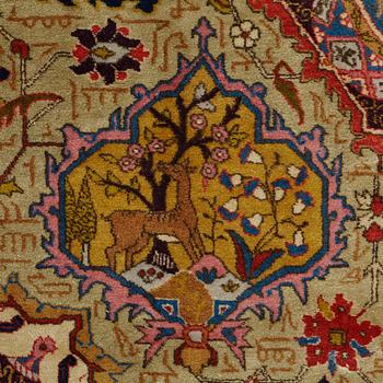 A CARPET, a semi-antique Tabriz, ca 342 x 269 cm.
