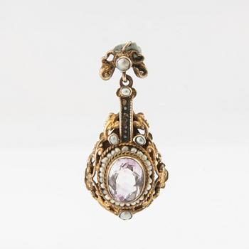 Pendant of gilded silver with an oval faceted amethyst, seed pearls, and enamel decoration, late 19th century.