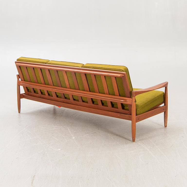 An Erik Wörtz 1962 walnut Kolding sofa for IKEA.