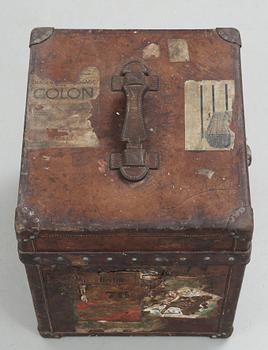 A early 20th cent brown leather trunk by Louis Vuitton.