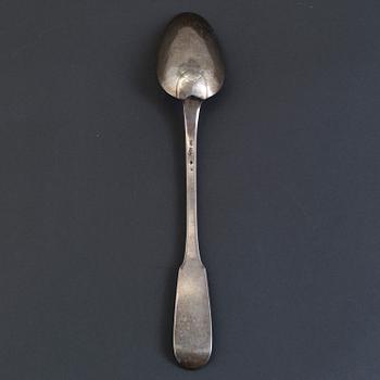 An 18th century French silver serving spoon.