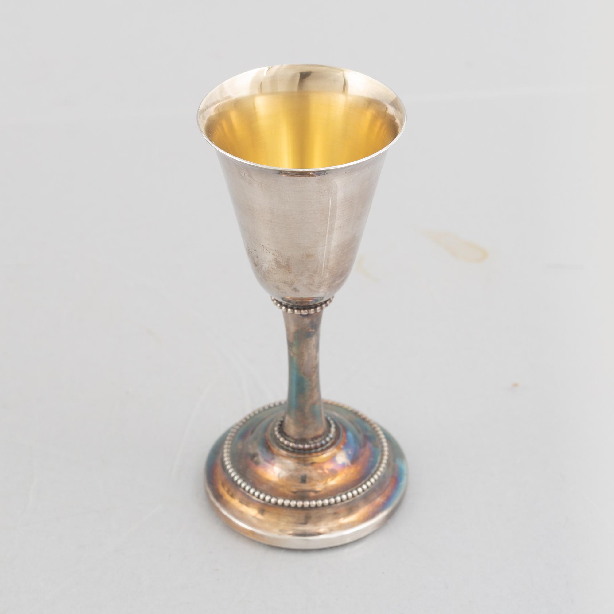 Karl-Axel Karlsson Silversmed, twelve sterling silver cups, Stockholm 1975-85.