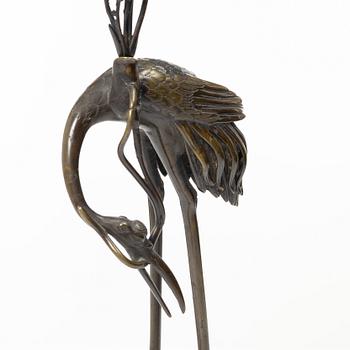 A bronze candle holder, Japan, 20th century.