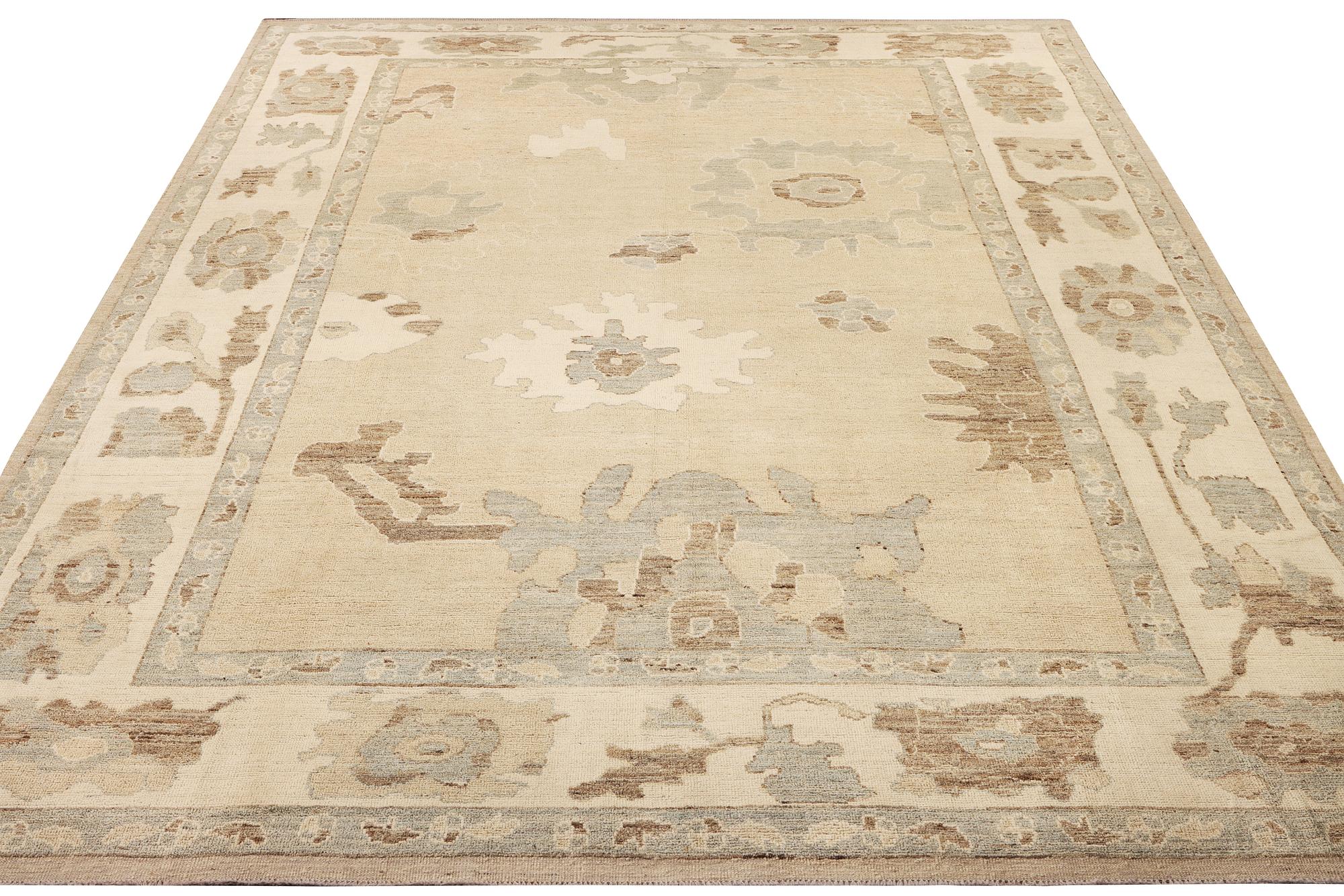 An Ushak design carpet, a. 426 x 307 cm.