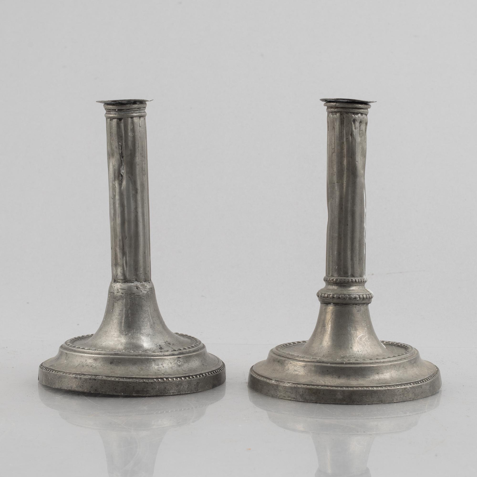 A pair of pewter candle sticks by Mathias Rundquist (active 1778-1820/35), Karlskrona, Sweden.