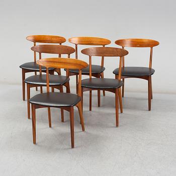 KURT ØSTERVIG, a teak dining suite with a round table and six chairs, Brande Möbelindustri, Denmark.