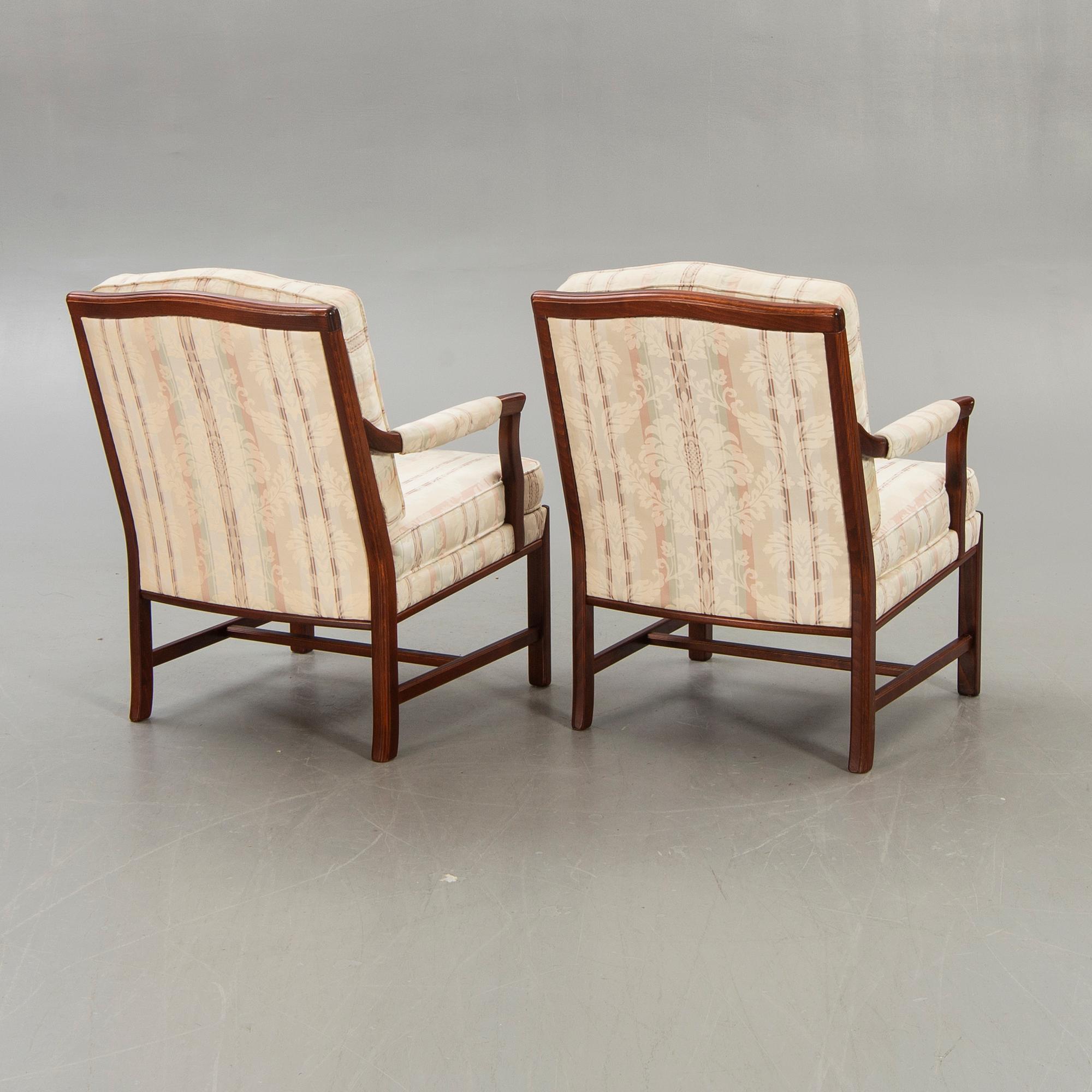 A pair of Ellinor armchairs from Bröderna Andersson later part of the 20th century.