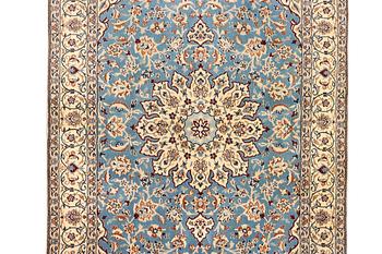 A Nain, part silk carpet, c. 196 x 120 cm.