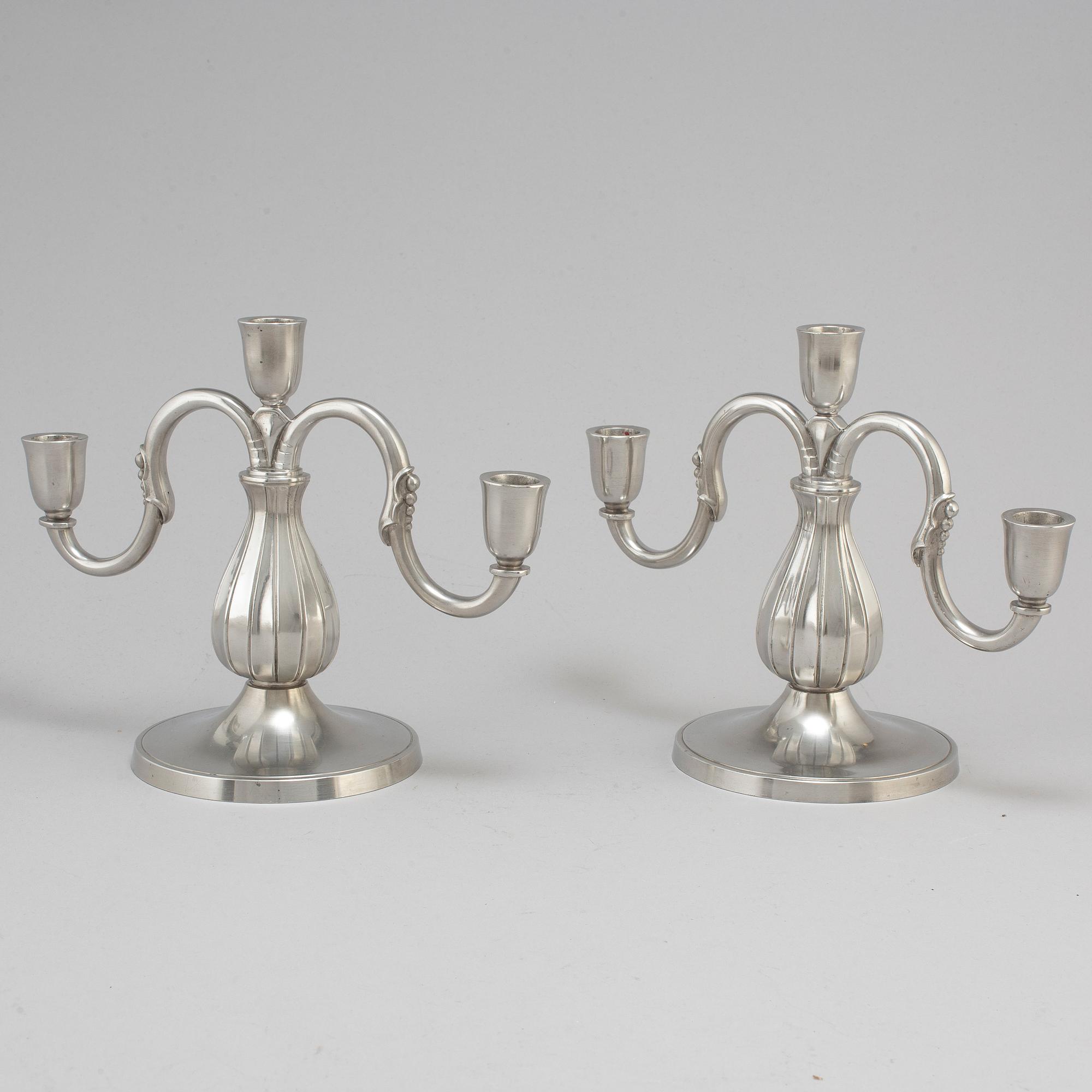 A pair of pewter candelabra from GAB Tenn, Stockholm, 1935.