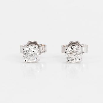Brilliant-cut diamond earrings.