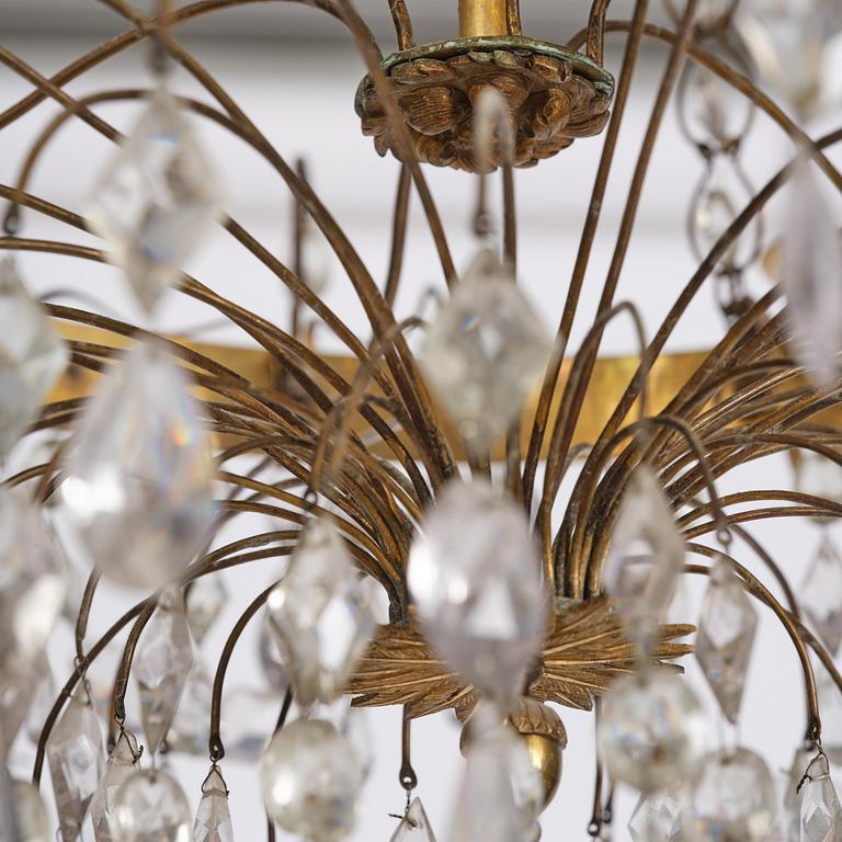 A Late gustavian green top glass six light chandelier.