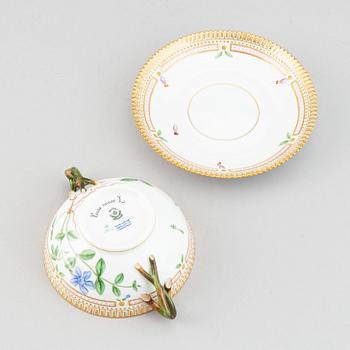 Royal Copenhagen, A 'Flora Danica' porcelain soup cup with saucer.