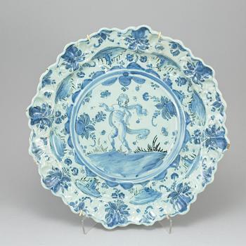 A large Historiato faince dish, late 19th Century.