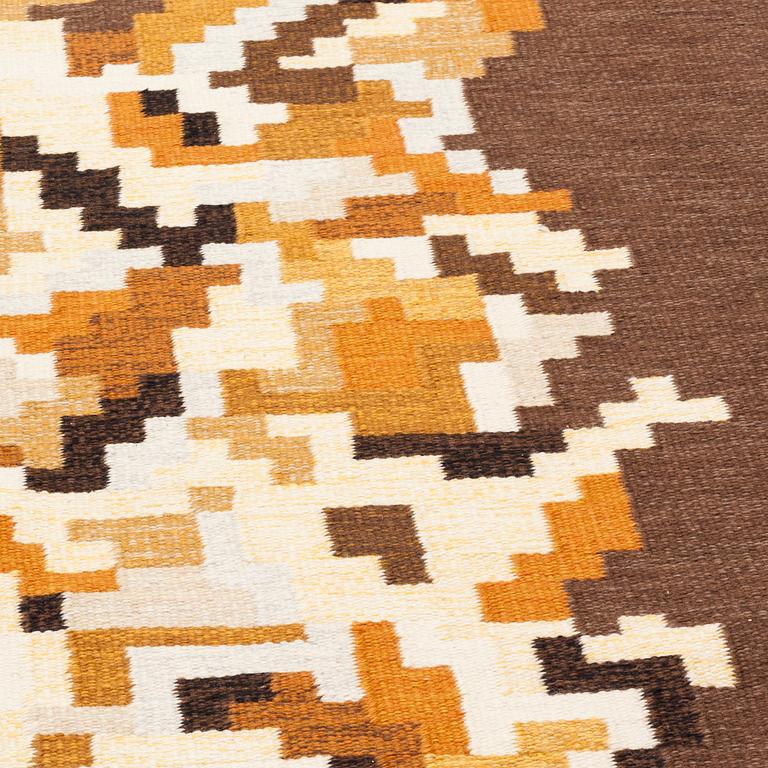 A CARPET, "Korall", flat weave. Signed V around 245 x 142 cm.