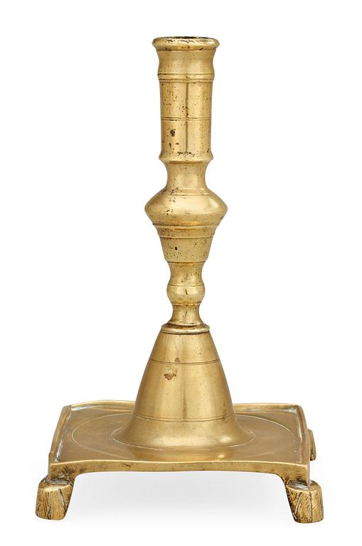 A Baroque 17/18th century brass candlestick.