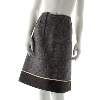 MARNI, a grey wool blend skirt with silver treads.