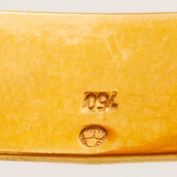 Bangle 18k gold with 1 charm, 19,3 g, does not open.