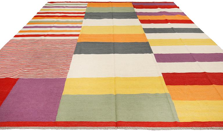 A flat weave carpet, c 395 x 297 cm.