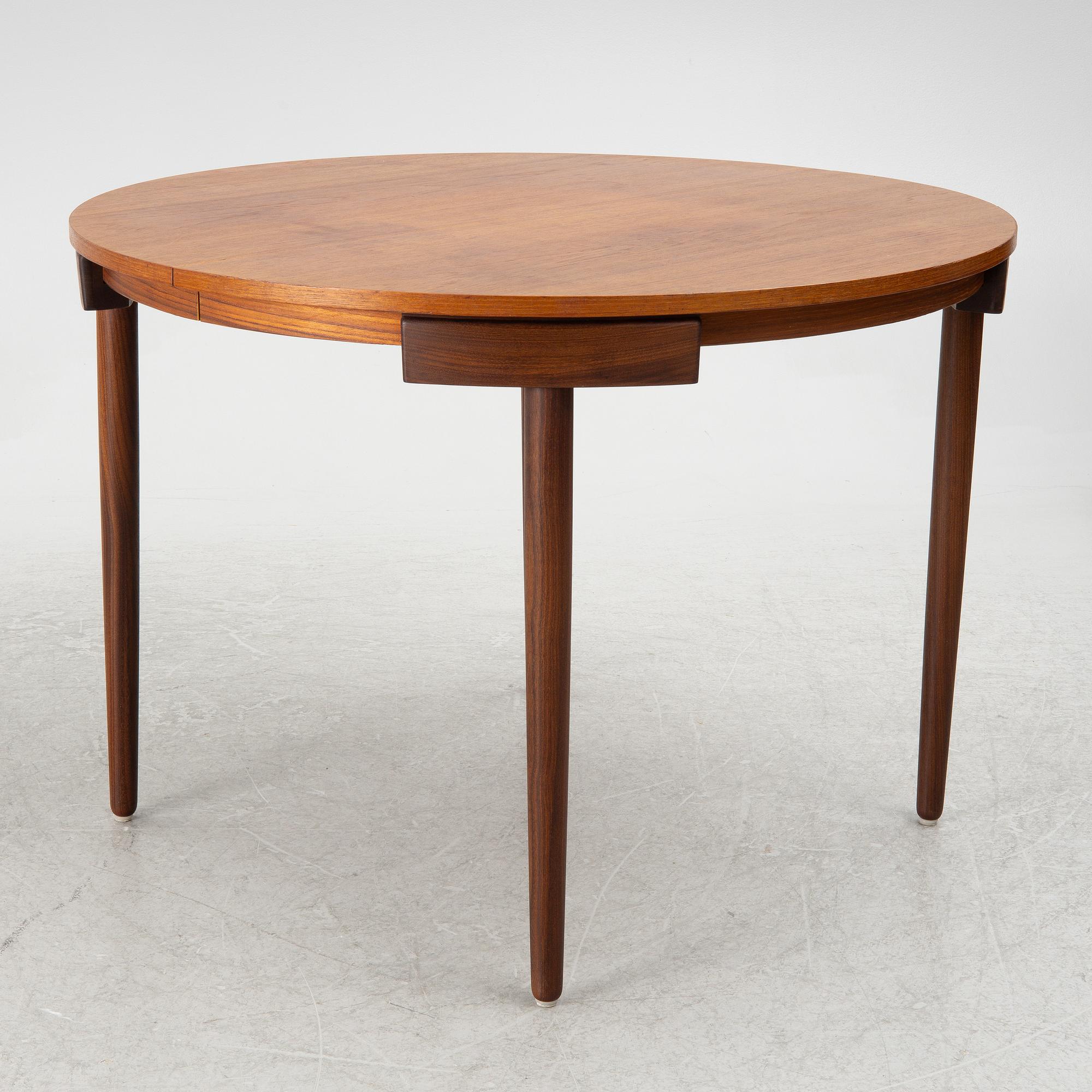 Hans Olsen, a dining table and four chairs, Frem Røjle, Denmark, 1950's.