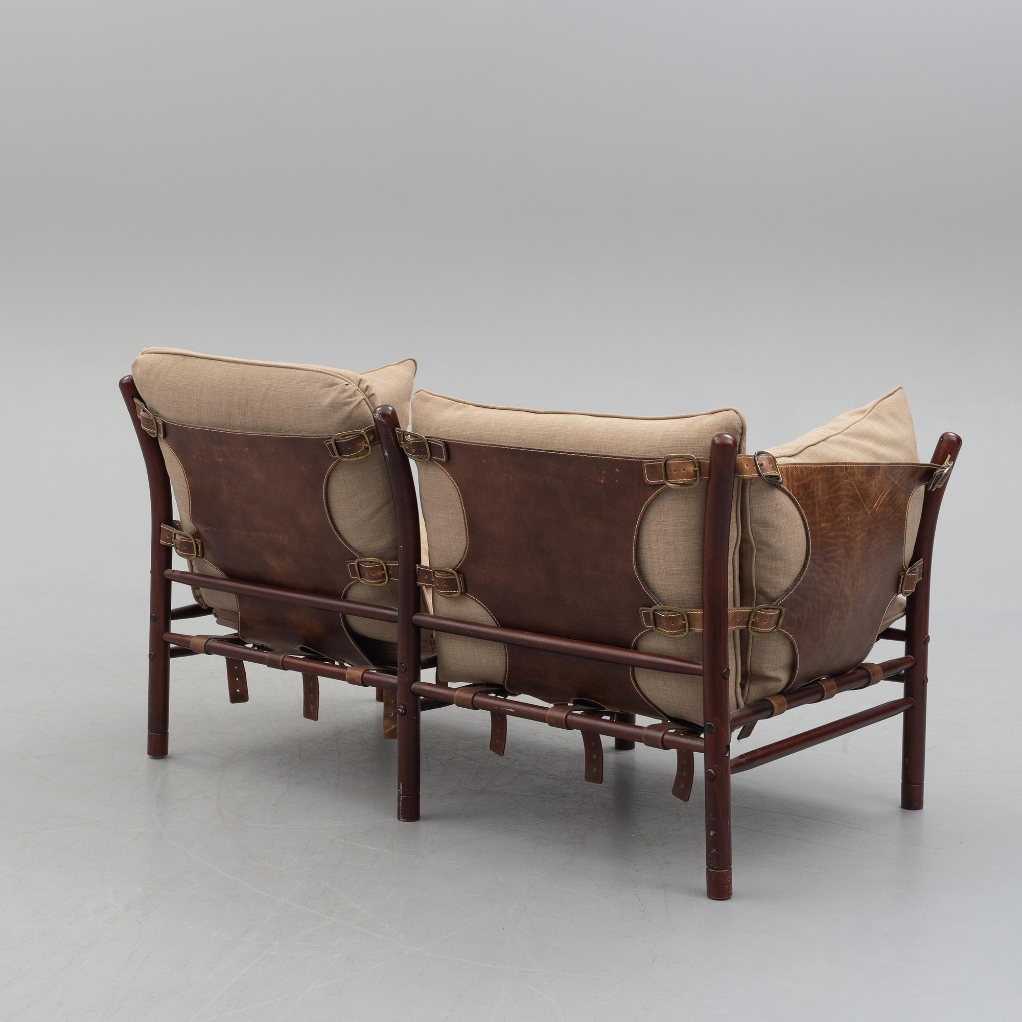 ARNE NORELL, an 'Ilona' stained wood and leather sofa fron Norell Möbel, Aneby, 1960's/70's.