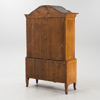 A Swedish rococo cabinet, mid 18th Century.