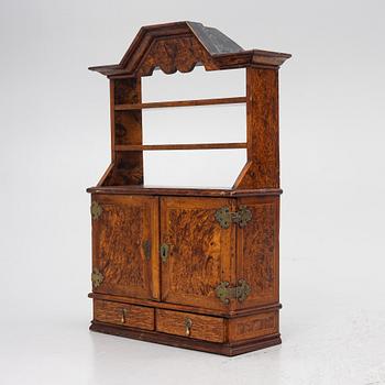 A late Baroque wall cabinet with shelves, first half of the 18th century.