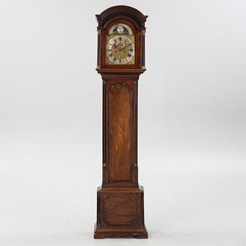 A mahogany veneered longcase clock, marked Peter Pohlmann, London, England, 18th century.
