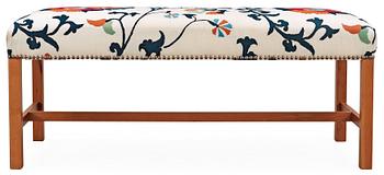 A Josef Frank cherry wood bench, Svenskt Tenn, model 2082.