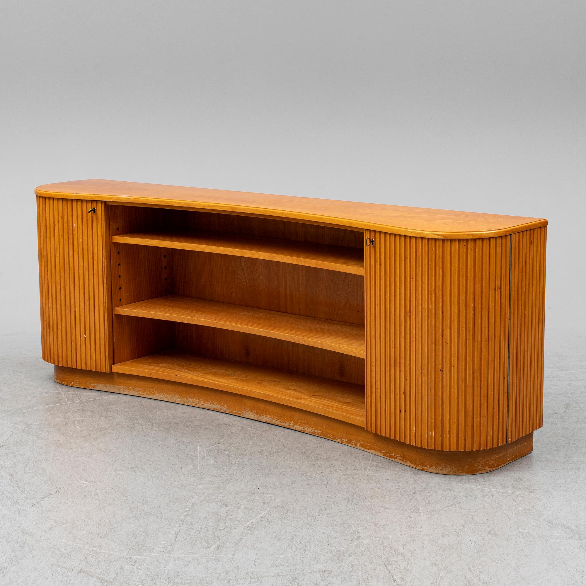 A 1940s elm veneered shelf.