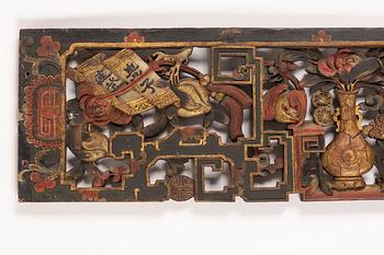 A Chinese carved wood panel, 19th Century.