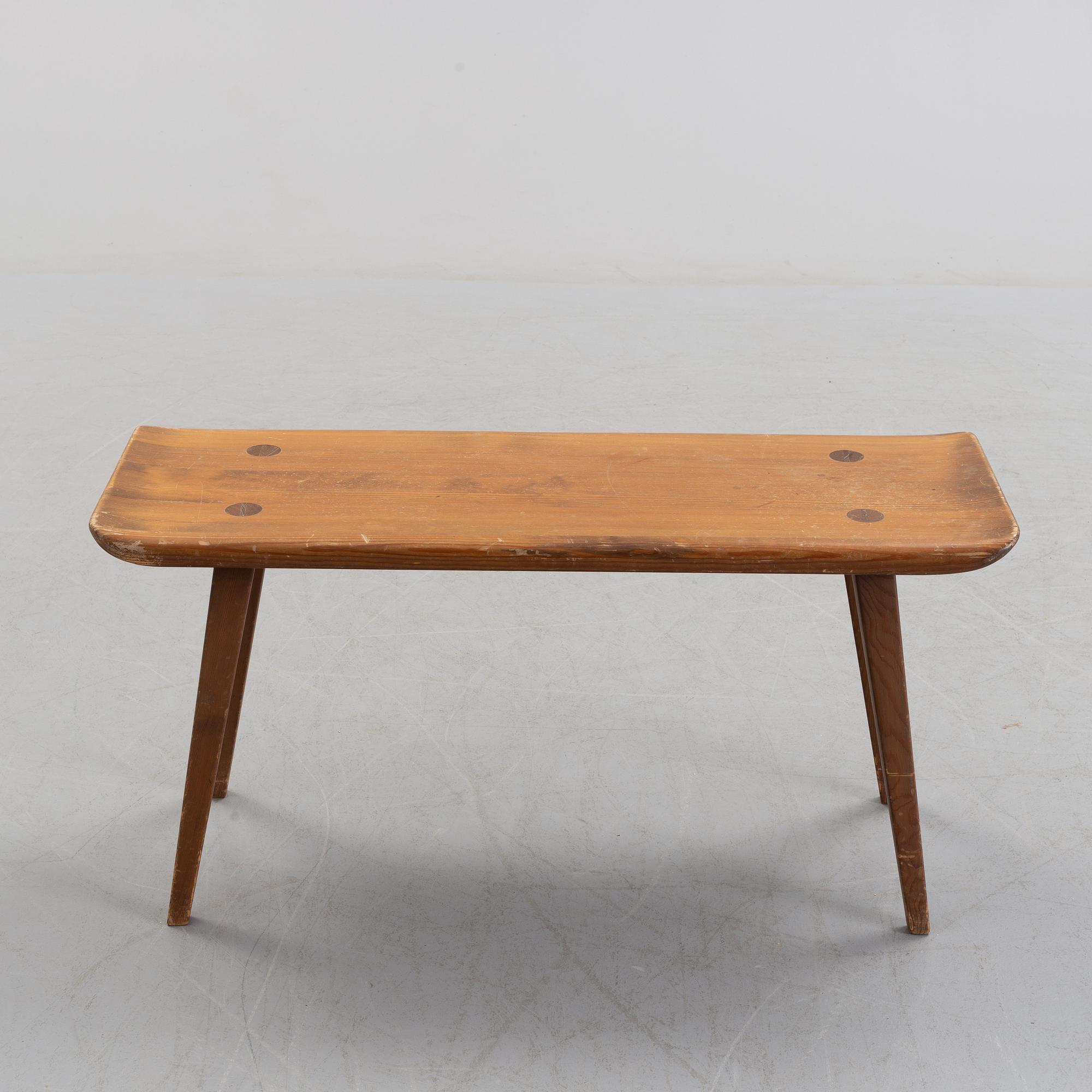 A 'Visingsö' bench by Carl Malmsten.