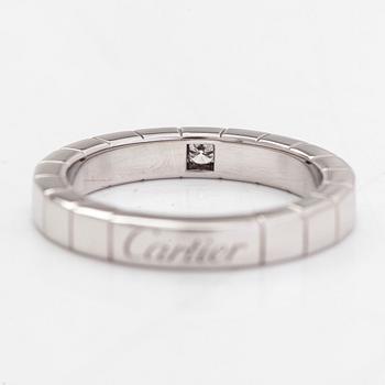 Cartier, an 18K white gold 'Lanières' ring with a diamond, ca. 0.04 ct.