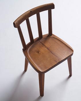 Axel Einar Hjorth, a set of six stained pine 'Utö' chairs, Nordiska Kompaniet, Sweden 1930s.