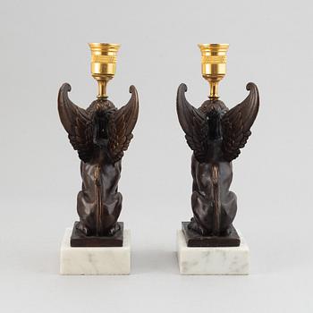 A pair of presumably Russian Empire candlesticks, early 19th Century.
