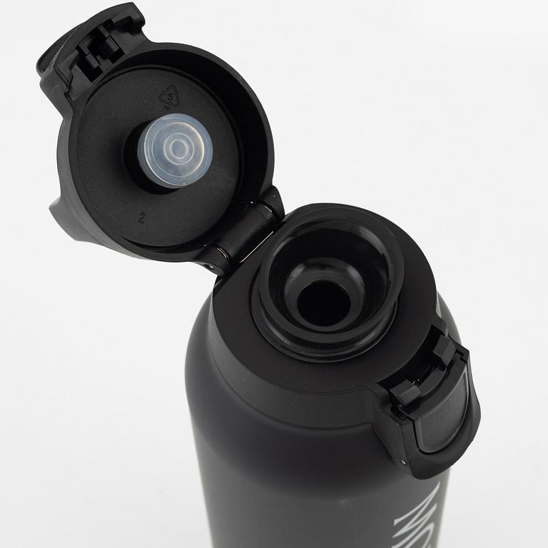 Moncler, book 'Freeze for Frieze' and thermos.