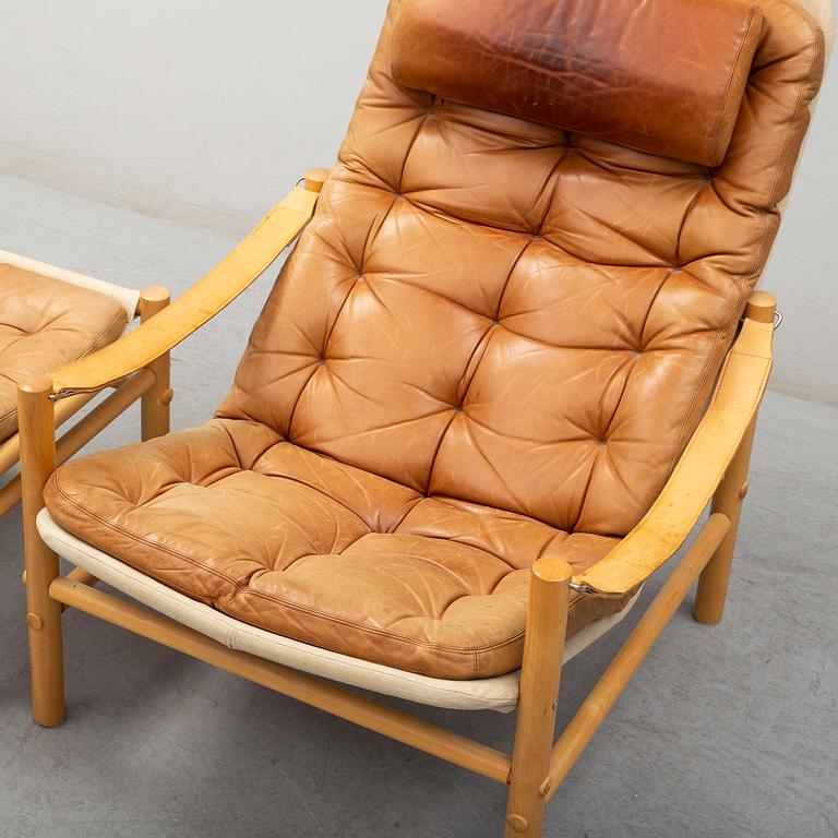 BROR BOIJE, a 'Junker' leather covered easy chair and ottoman from Dux.