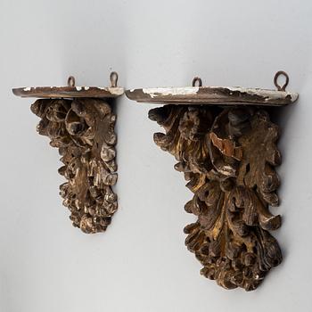 A pair of carved wood wall sconces, 18th/19th century.