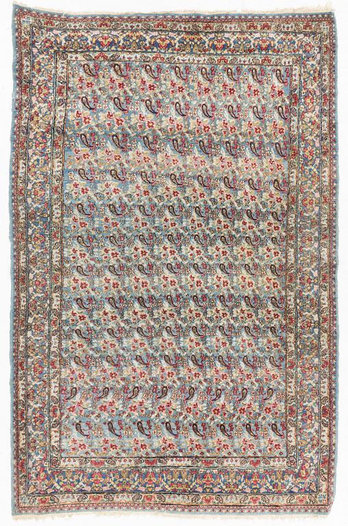 A Persian rug, c. 220 x 140 cm.