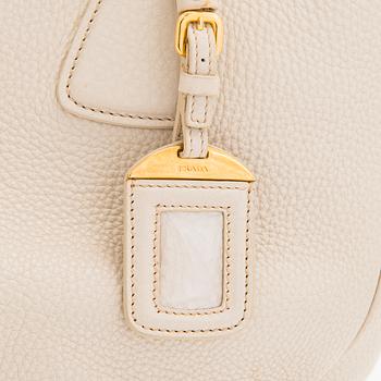 Prada, a 'Vitello Daino Tote' bag.