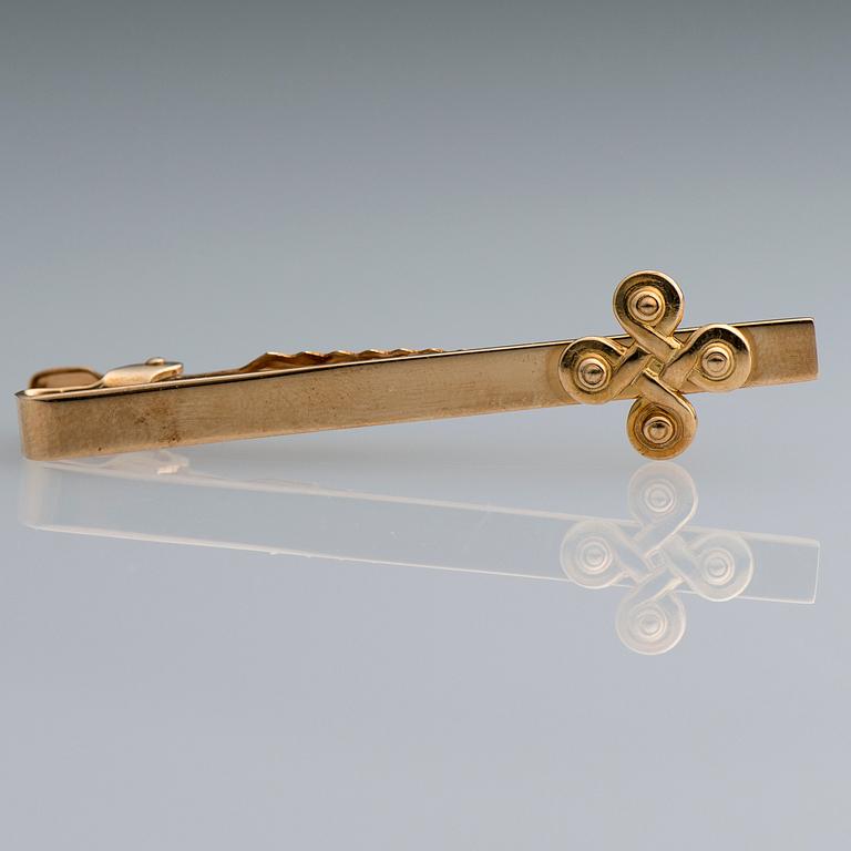 SLIPSNÅL, "S:t Johannes vapen", Kalevala Koru 1998, 14K guld.