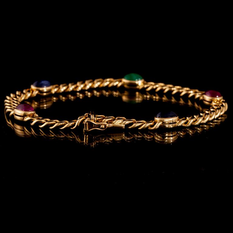 ARMBAND, 18K guld, safirer, rubiner, smaragd. 1988. Vikt ca 22,9 g.