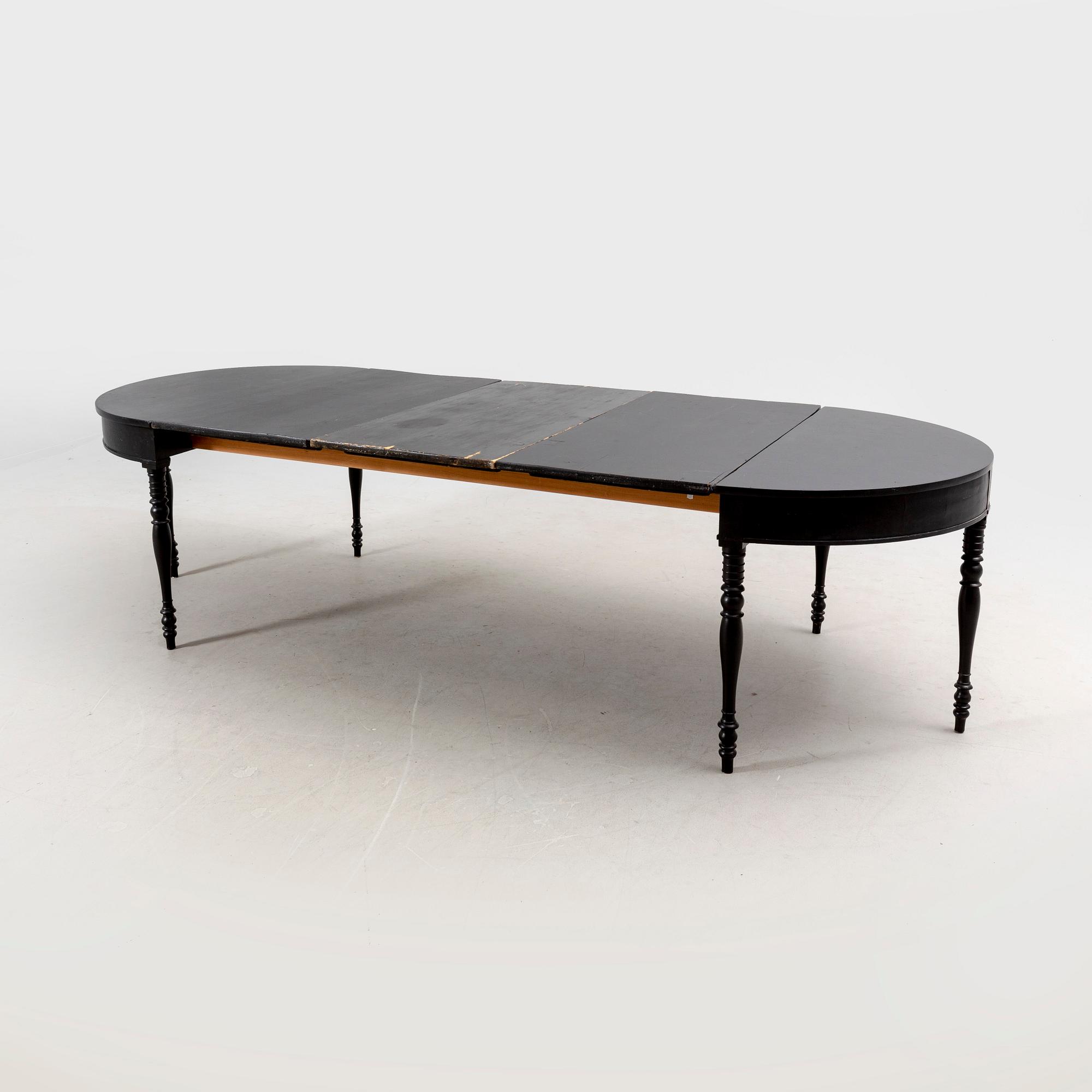 A mid 18th century painted dining table.