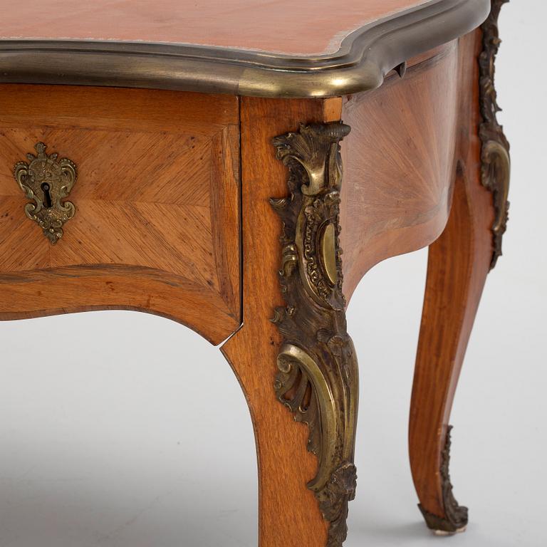 A French Louis XV-style parquetry and gilt bronze-mounted 'bureau plat', late 19th century.