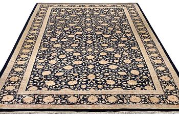 A Meshed carpet, c. 538 x 298 cm.
