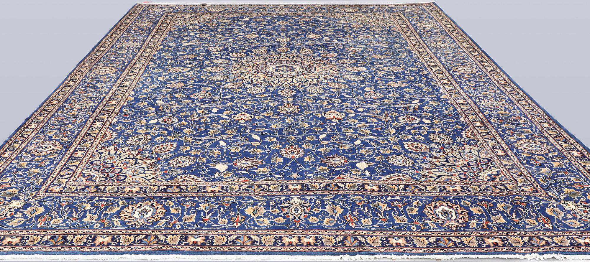 A Kashmar carpet, 408 x 307 cm.