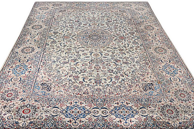 A Nain carpet, part silk, 9 laa, c. 453 x 298 cm.