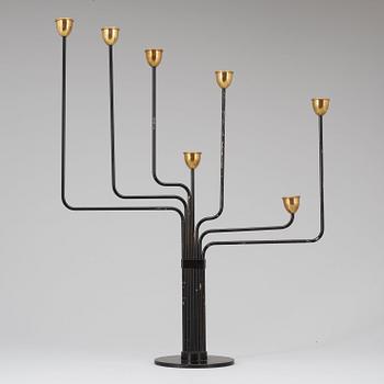 A Piet Hein brass and black lacquered metal candelabrum, 1950's-60's.