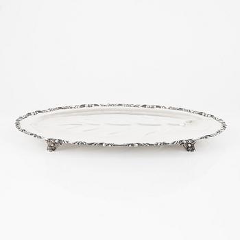 A Mexican sterling silver platter, Rococo-style.